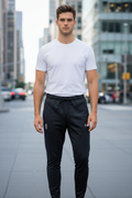 Nike Dri-FIT Academy fekete futball edzőnadrág elölnézet, fehér 8-as szám és Nike Swoosh